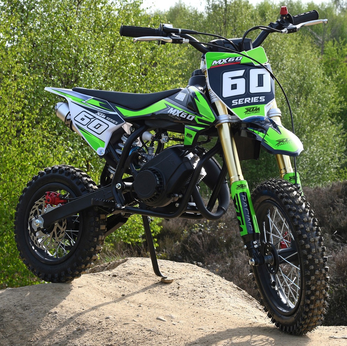 Sur-Ron Storm Bee electric dirt bike flying over Australian trail — high-performance electric off-road bike with 74V battery and 6500W peak power