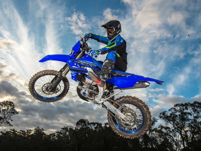 Talaria Sting R electric enduro bike conquering rocky Australian terrain — 8kW oil-bath gearbox, 45Ah high-discharge battery, built for extreme off-road